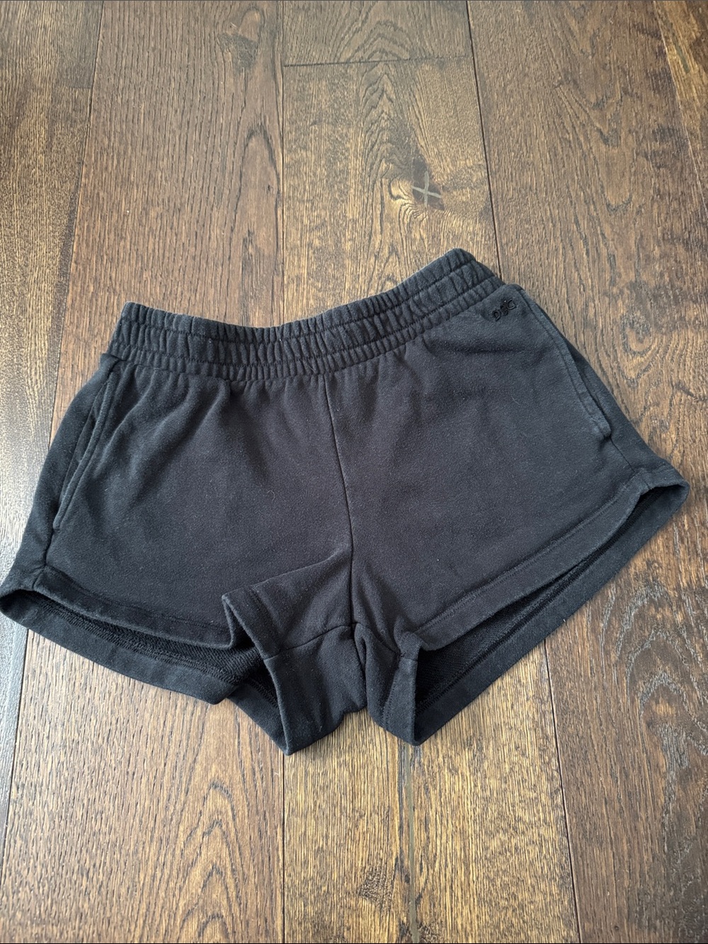 DSG charcoal black lounge shorts. elastic waistband.  side pocket logo size XL
